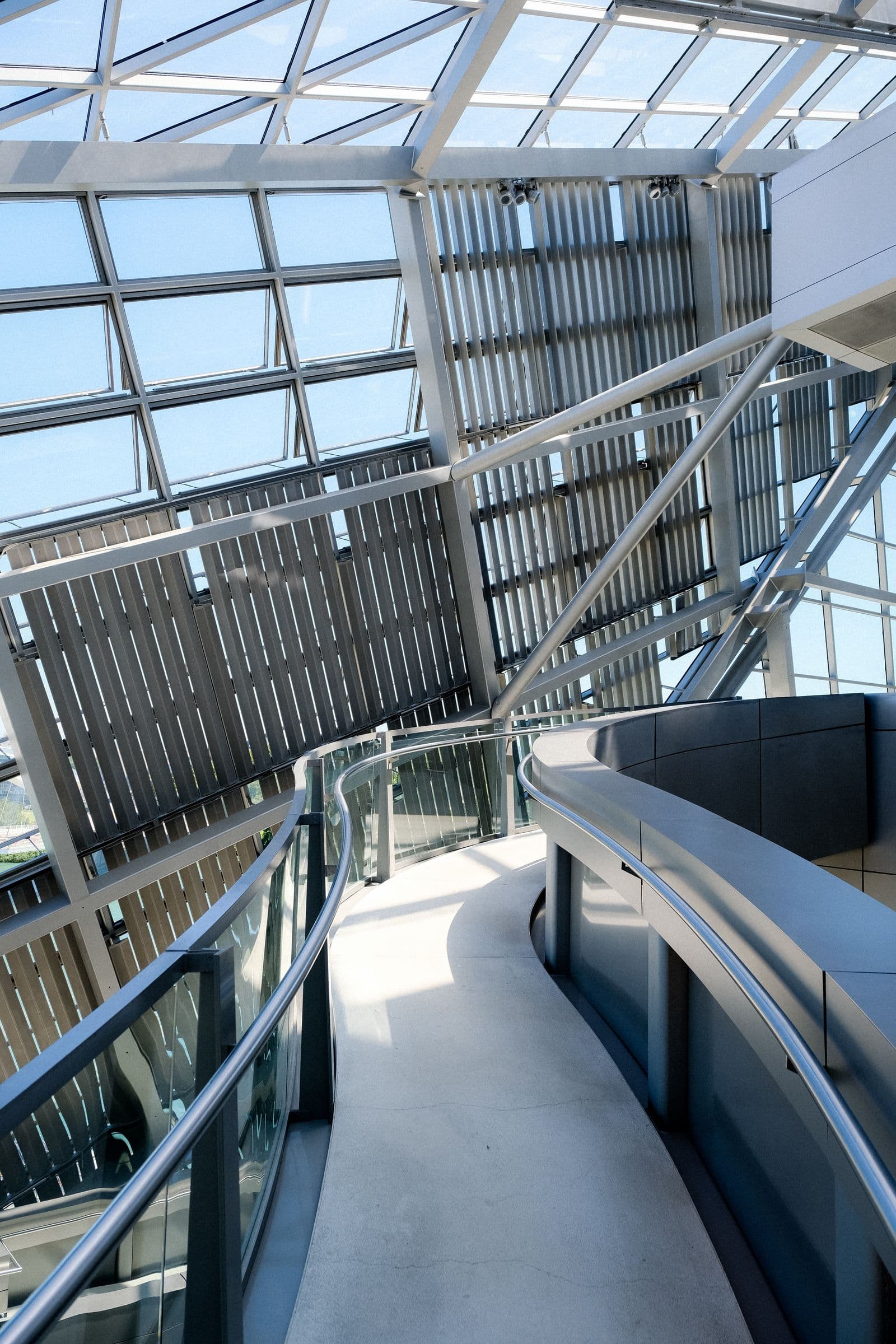Precision-engineered commercial building interior with exposed structural systems